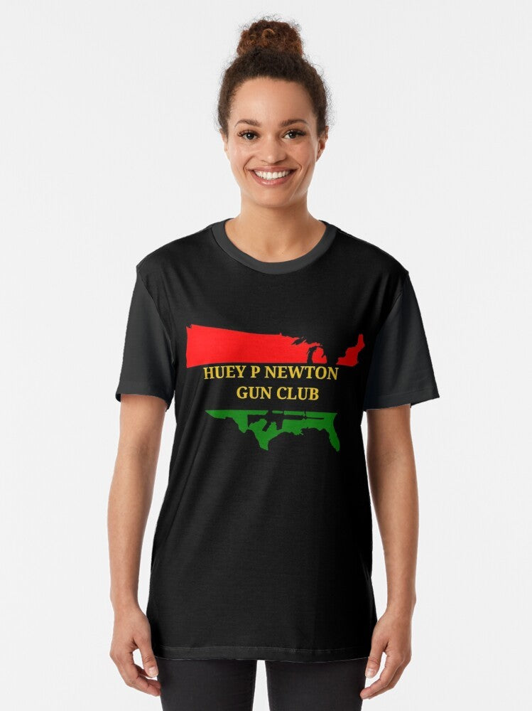 Graphic t-shirt featuring the portrait of Huey P. Newton, a prominent Black Panther Party leader and revolutionary activist. - Women