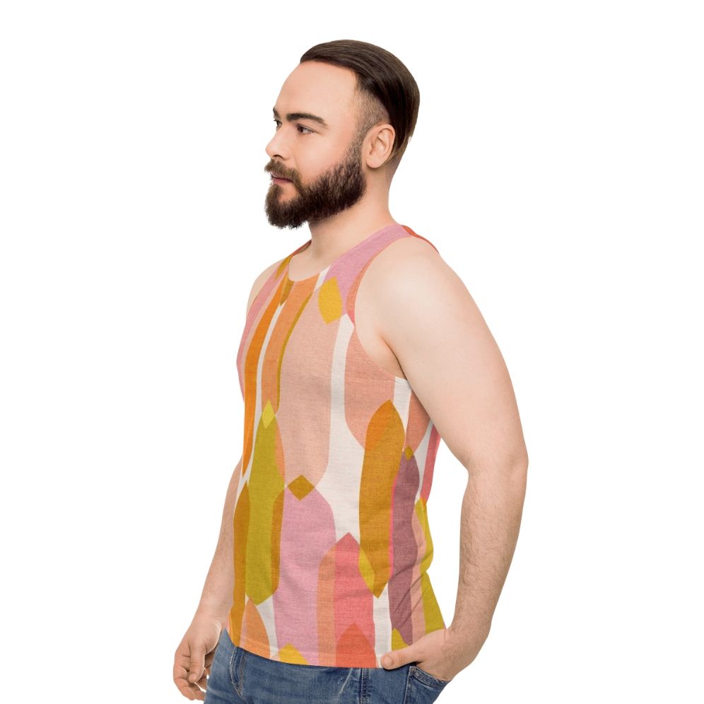 Vibrant mid-century inspired unisex tank top with abstract droplet pattern - men side