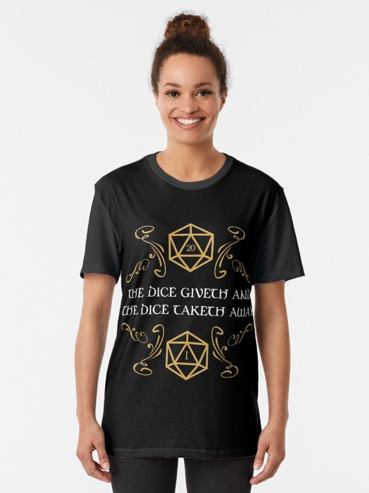 Dungeons and Dragons t-shirt featuring a graphic design of dice with "The Dice Giveth and Taketh Away" text and "Natural 20" and "Critical Fail" icons. - Women