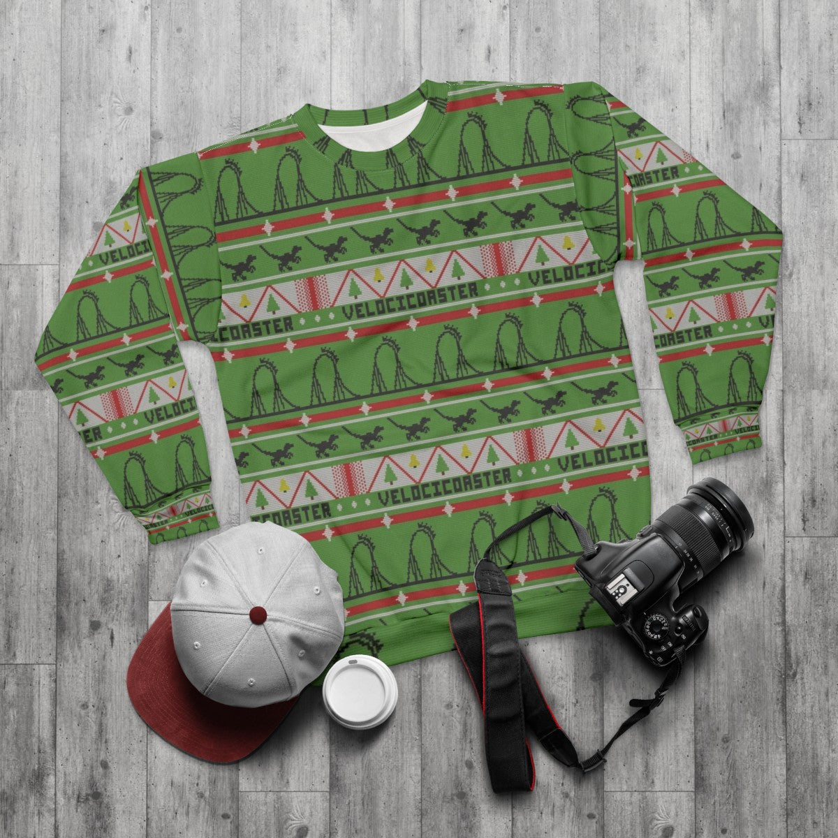 Velocicoaster Ugly Christmas Sweater Sweatshirt with Dinosaur and Roller Coaster Theme - flat lay