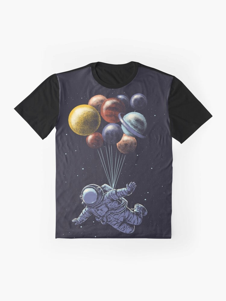 Space travel graphic t-shirt featuring a colorful, surrealist design of the solar system and cosmic elements - Flat lay