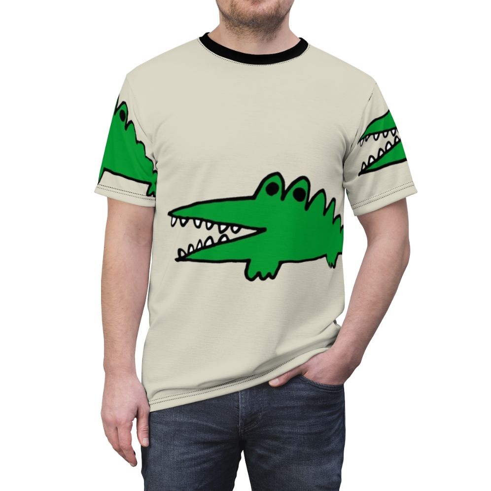 Whimsical illustration of a cartoon alligator facing big challenges on a vintage-style t-shirt - men front