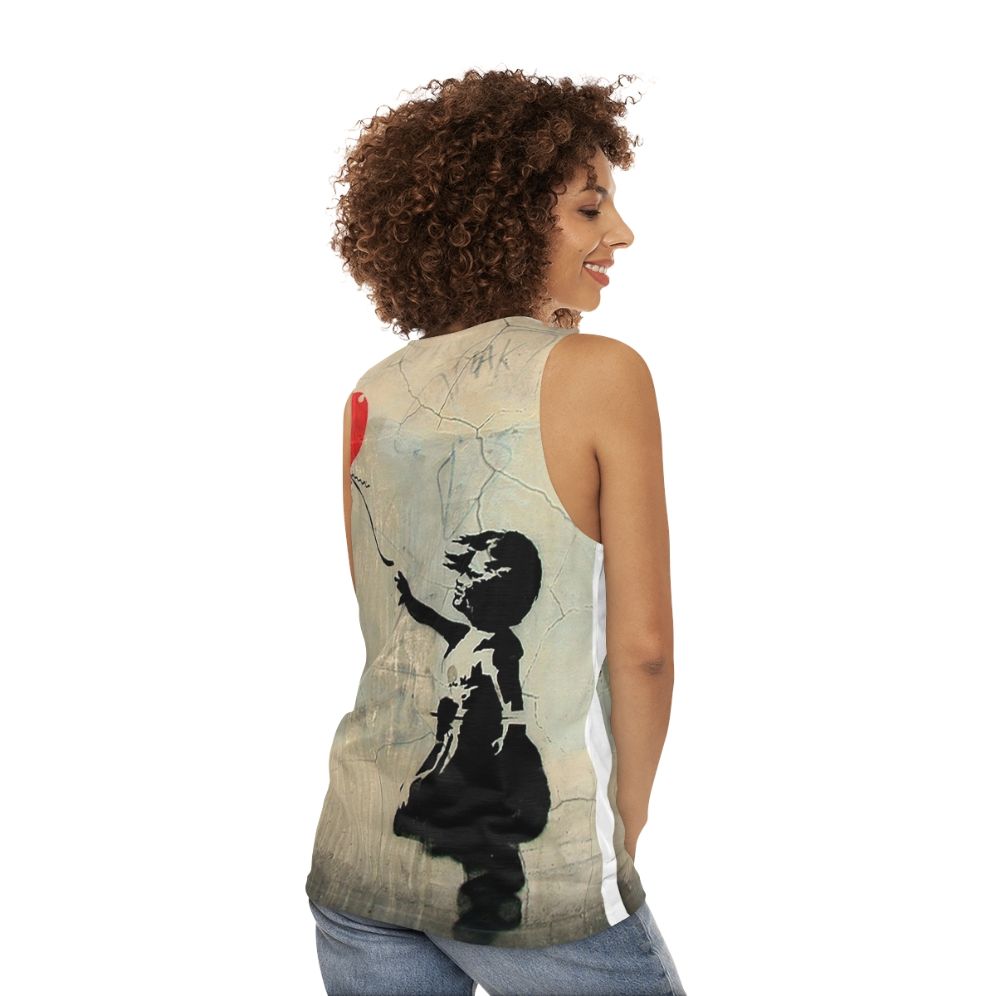 Banksy-inspired red tank top with heart balloon graphic - women back