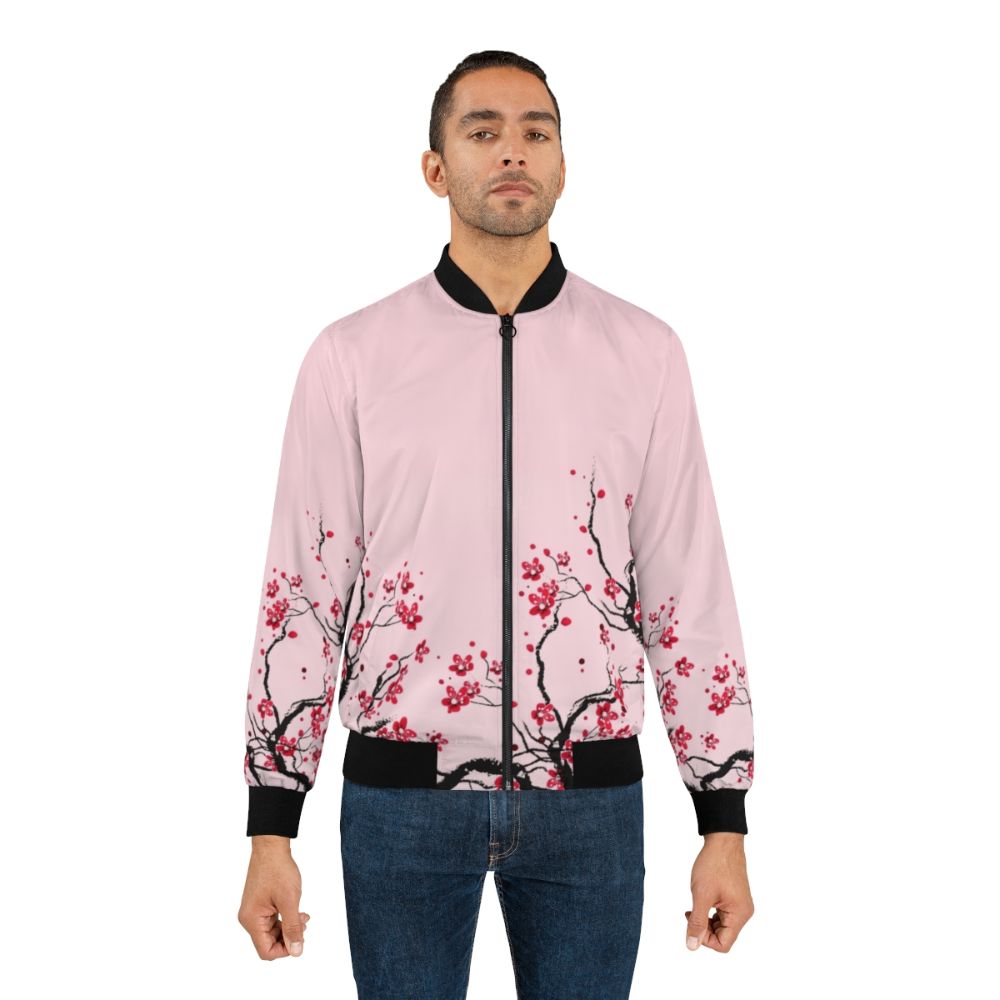 A stylish bomber jacket featuring a delicate cherry blossom floral design - Lifestyle