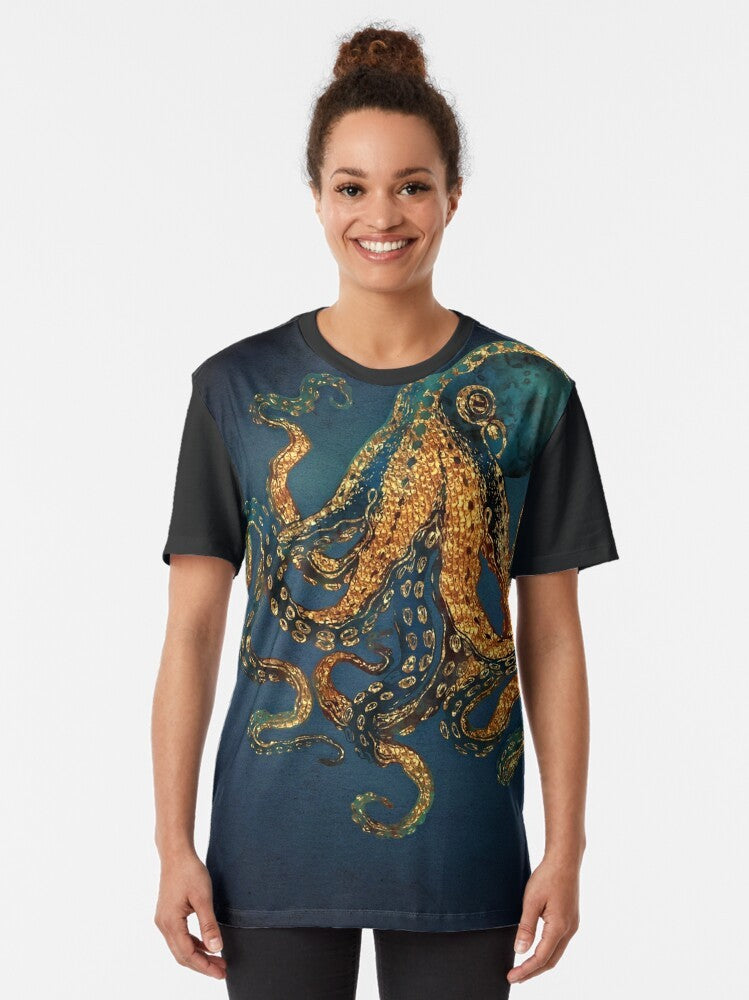 Underwater Dream Graphic T-Shirt featuring an abstract, watercolor-style octopus design in shades of blue, cobalt, navy, and aqua. - Women