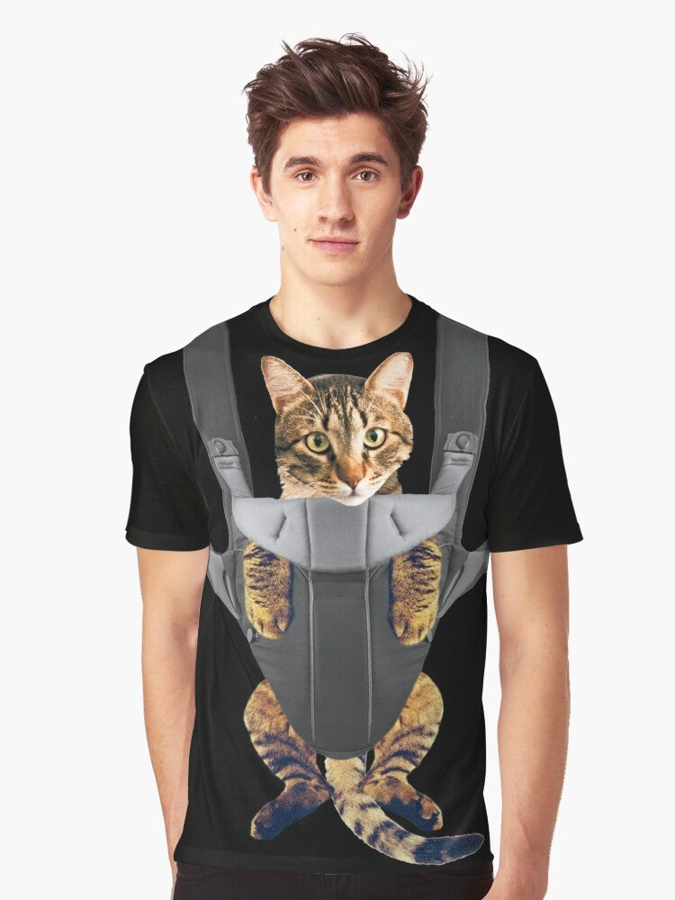 A funny graphic t-shirt design featuring a cat in a baby carrier. - Men