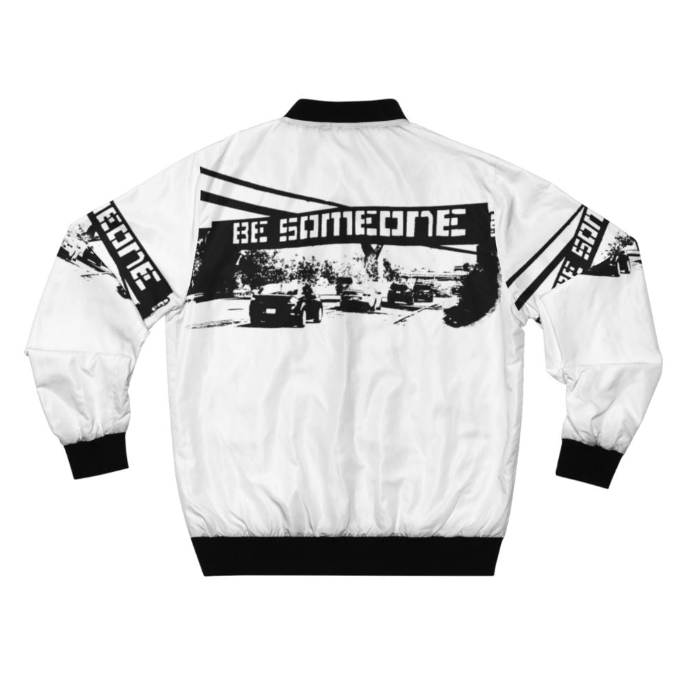 "Be Someone Houston Bomber Jacket featuring graffiti-inspired two-tone design and community-driven graphics" - Back