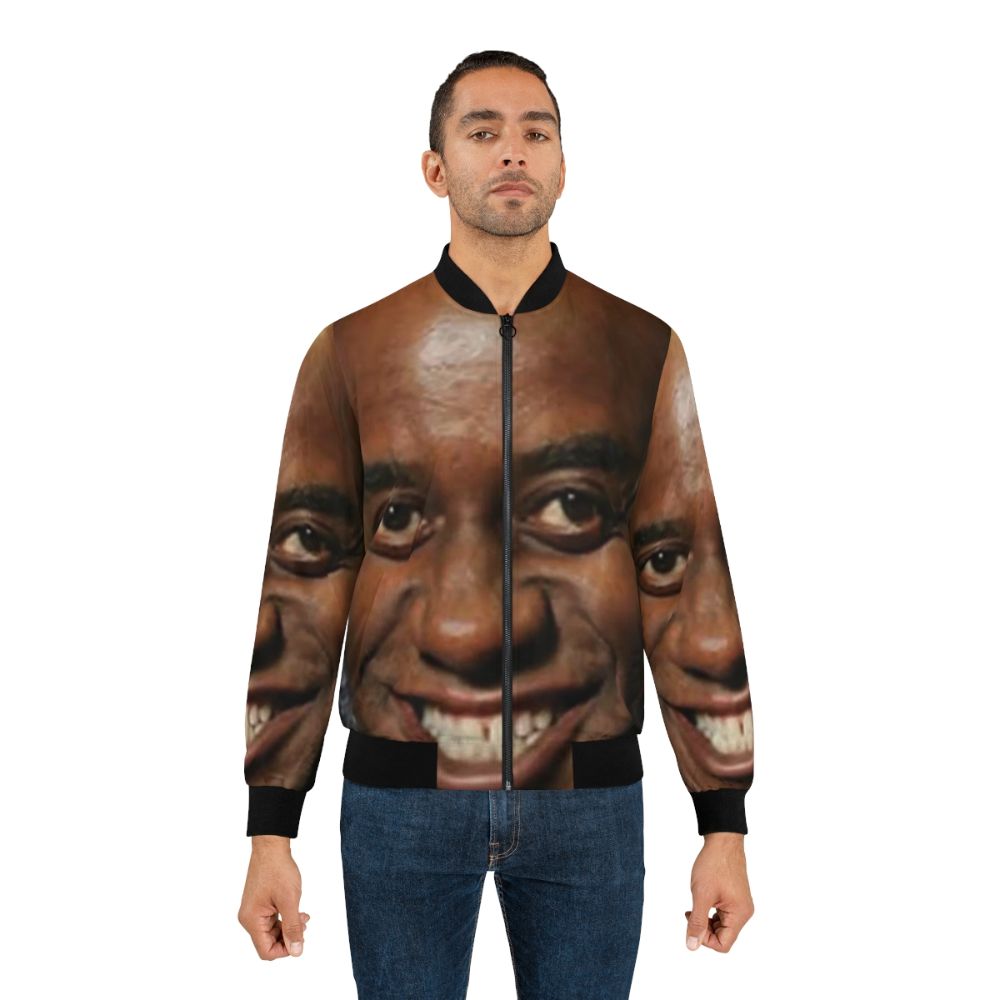 Ainsley Harriott wearing a large, greasy bomber jacket with a spicy rub for your meat - Lifestyle