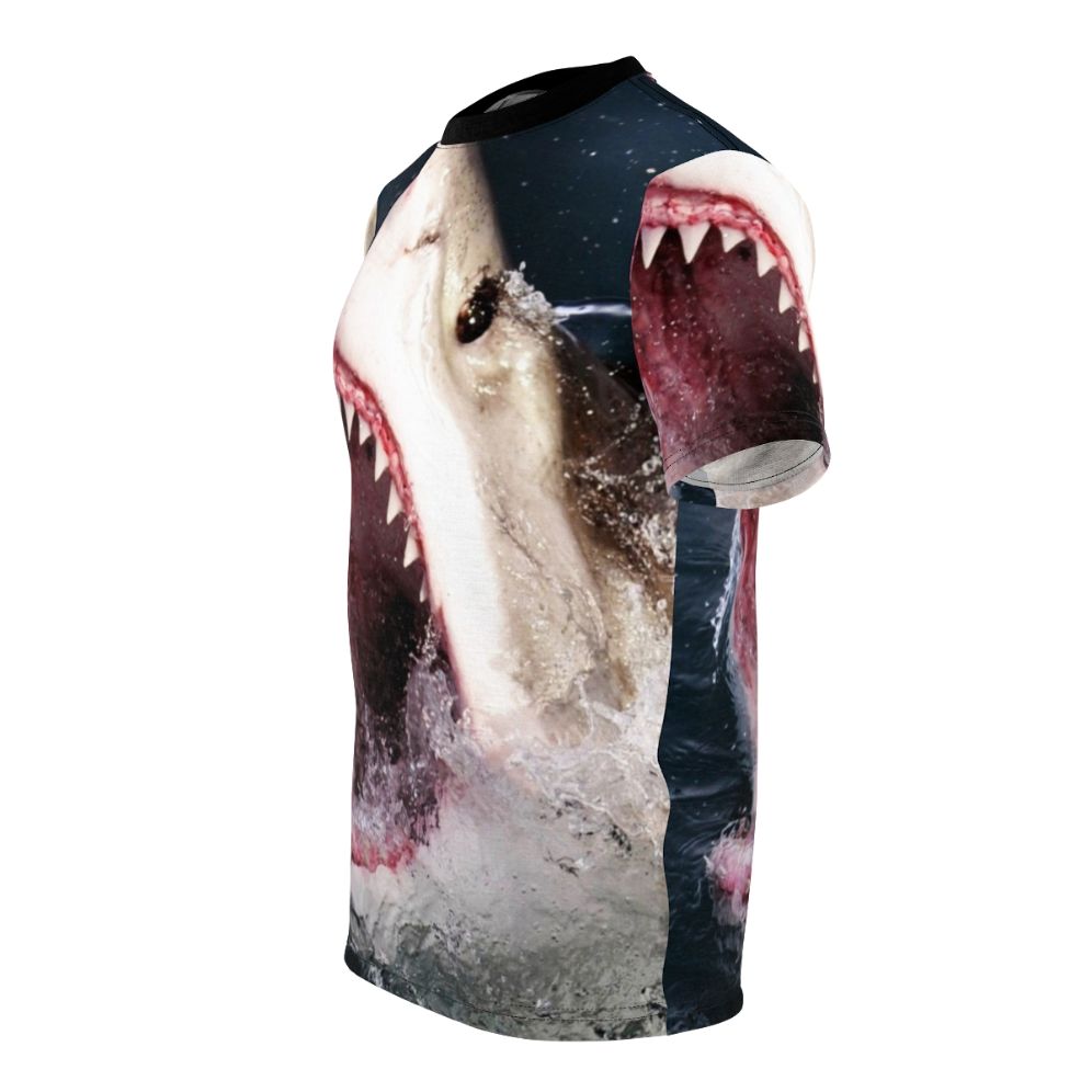 A realistic 3D graphic of a shark taking a bite out of a t-shirt on a solid background. - men left