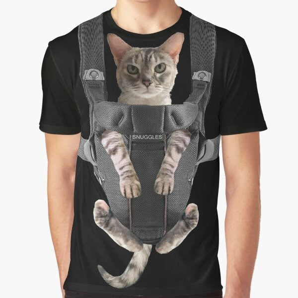 A cute and funny graphic of a gray cat snuggled up in a baby carrier.