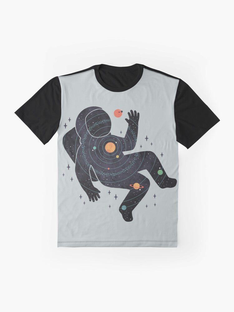 Graphic t-shirt design featuring a minimalist space and cosmos theme with an astronaut, planets, and the solar system. - Flat lay