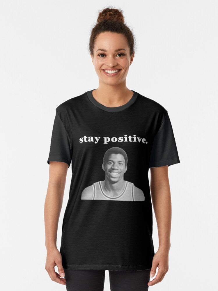 "Stay Positive" graphic t-shirt featuring a portrait of basketball legend Magic Johnson - Women