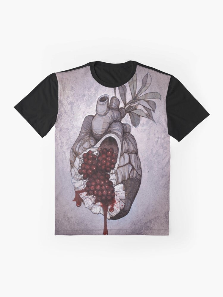 Graphic t-shirt featuring an anatomical illustration of a human heart with pomegranate seeds, inspired by the Greek mythology of Persephone. - Flat lay