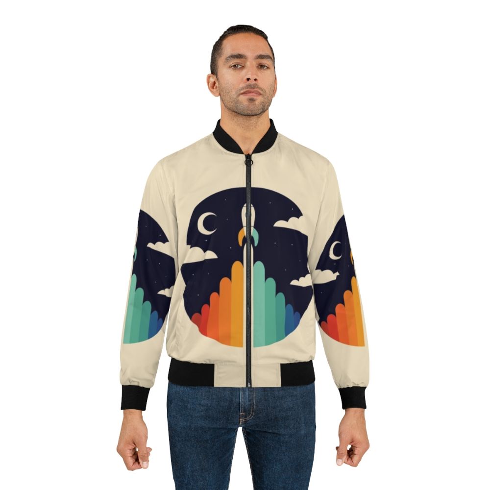 Up bomber jacket featuring a graphic of a rocket, moon, and clouds - Lifestyle