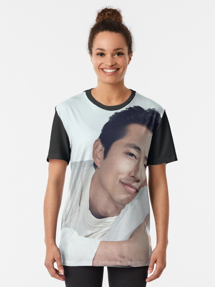 Steven Yeun, Korean actor known for The Walking Dead, wearing a graphic t-shirt - Women