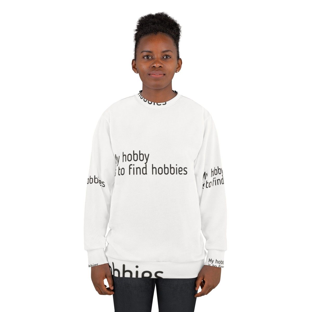 A person wearing a sweatshirt that reads "My Hobby Is To Find Hobbies" - women