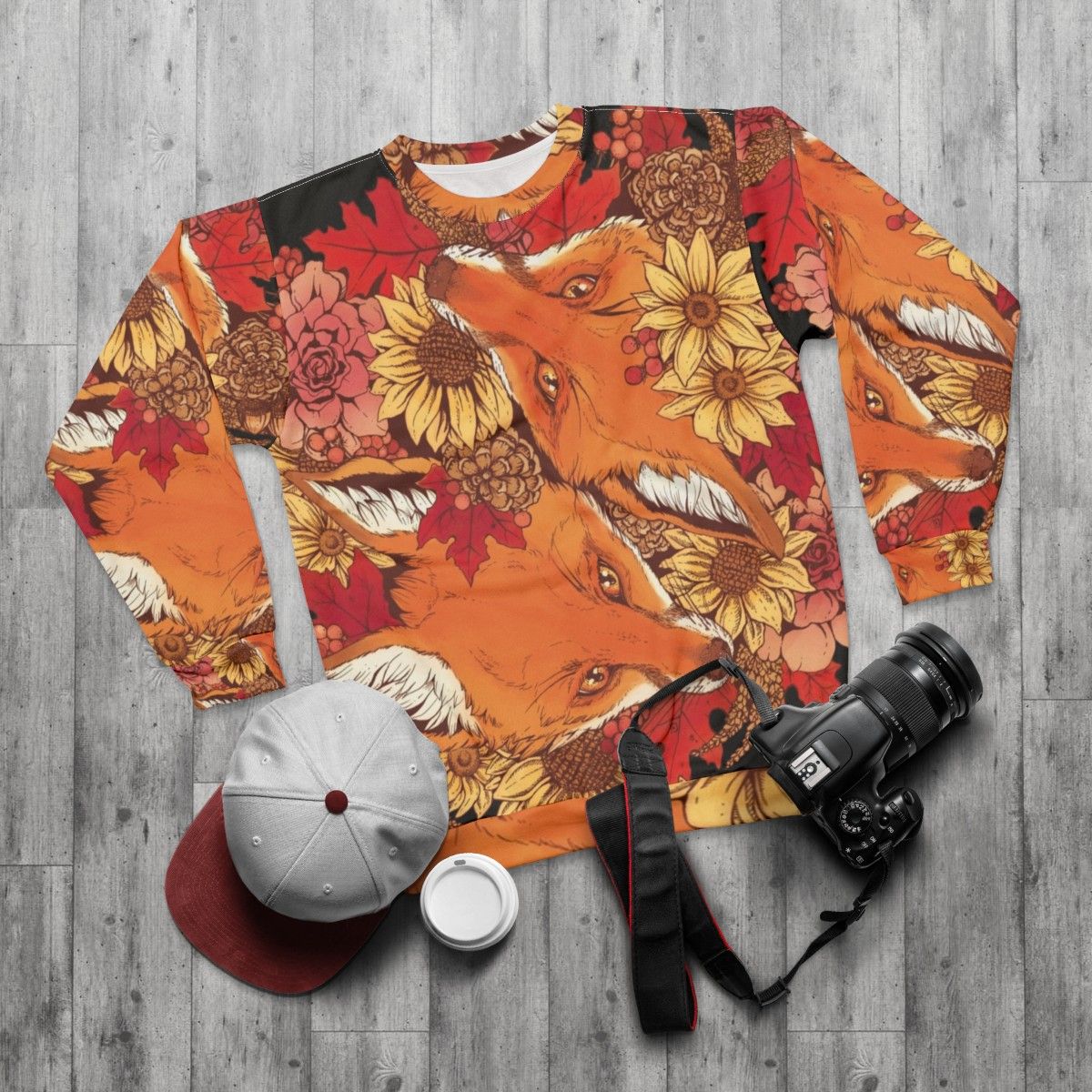 Autumn Fox Bloom Sweatshirt with foxes, sunflowers, and fall leaves - flat lay