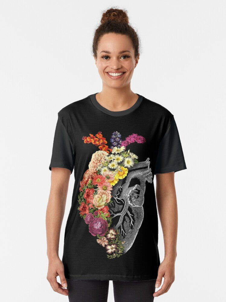 Graphic t-shirt with a flower heart design representing spring, transformation, and change. - Women