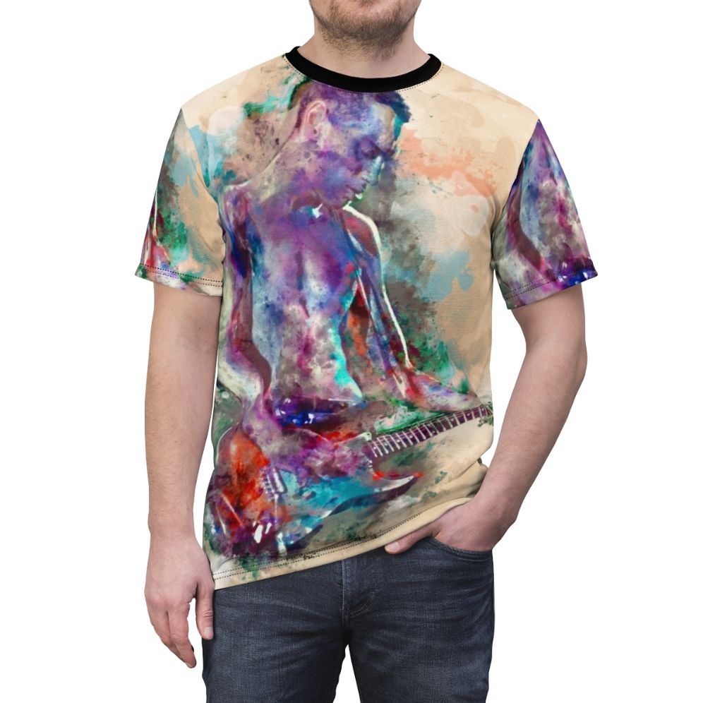 A realistic watercolor graphic of a young male guitar player on a t-shirt - men front