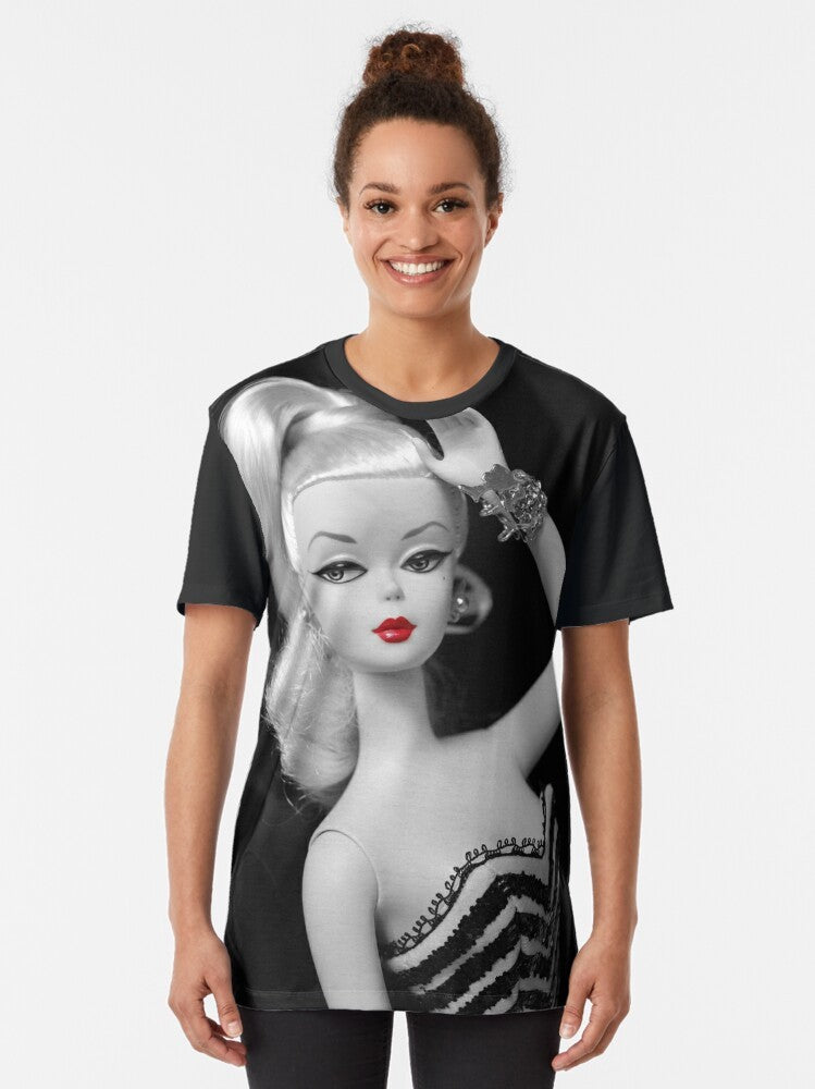 Vintage Silkstone Doll Graphic T-Shirt featuring a black and white image of a classic doll with red lipstick - Women