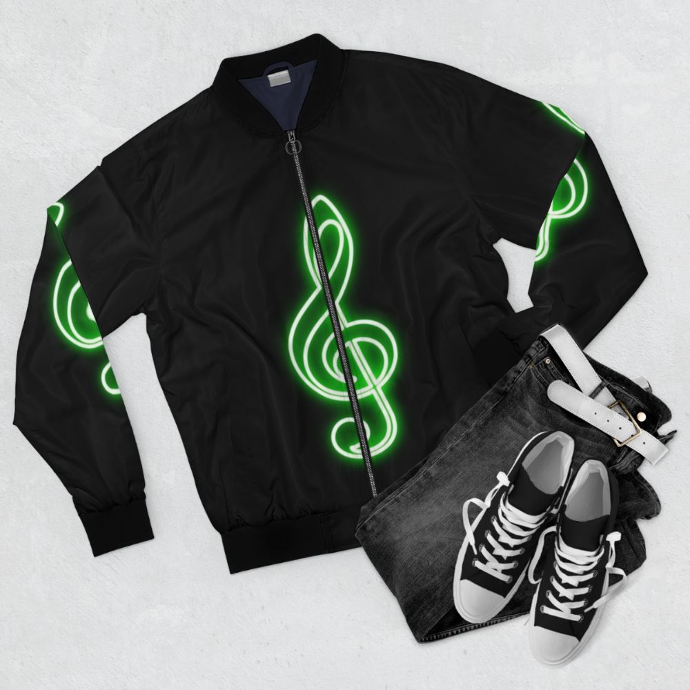 Neon green bomber jacket with a treble clef design - Flat lay