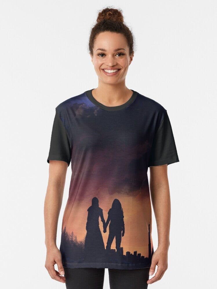 "The 100" Clarke Griffin and Lexa graphic t-shirt design featuring an Earth and sky motif - Women