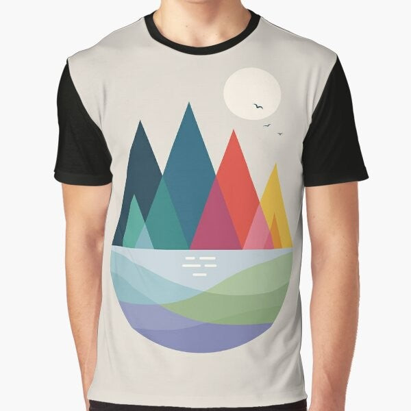 Vibrant and colorful graphic t-shirt featuring a landscape dream with a rainbow and geometric elements