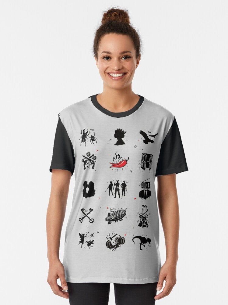 A graphic t-shirt featuring the logos and artwork of iconic rock bands from the 60s, 70s, 80s, and 90s. - Women