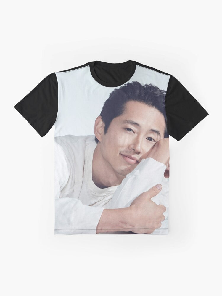 Steven Yeun, Korean actor known for The Walking Dead, wearing a graphic t-shirt - Flat lay