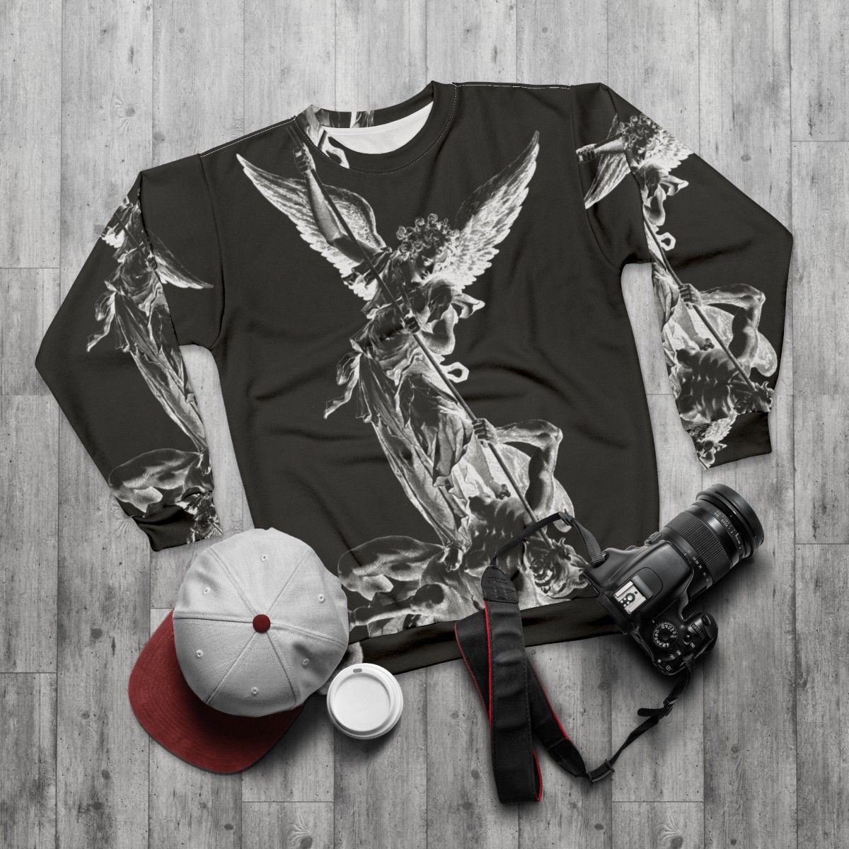 Archangel Michael defeating the devil on a religious sweatshirt - flat lay