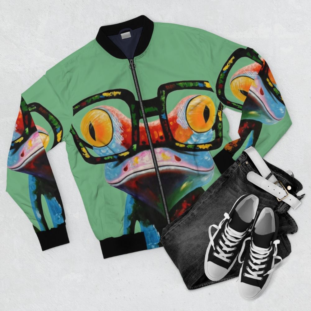 Colorful bomber jacket featuring a hipster frog wearing nerd glasses - Flat lay