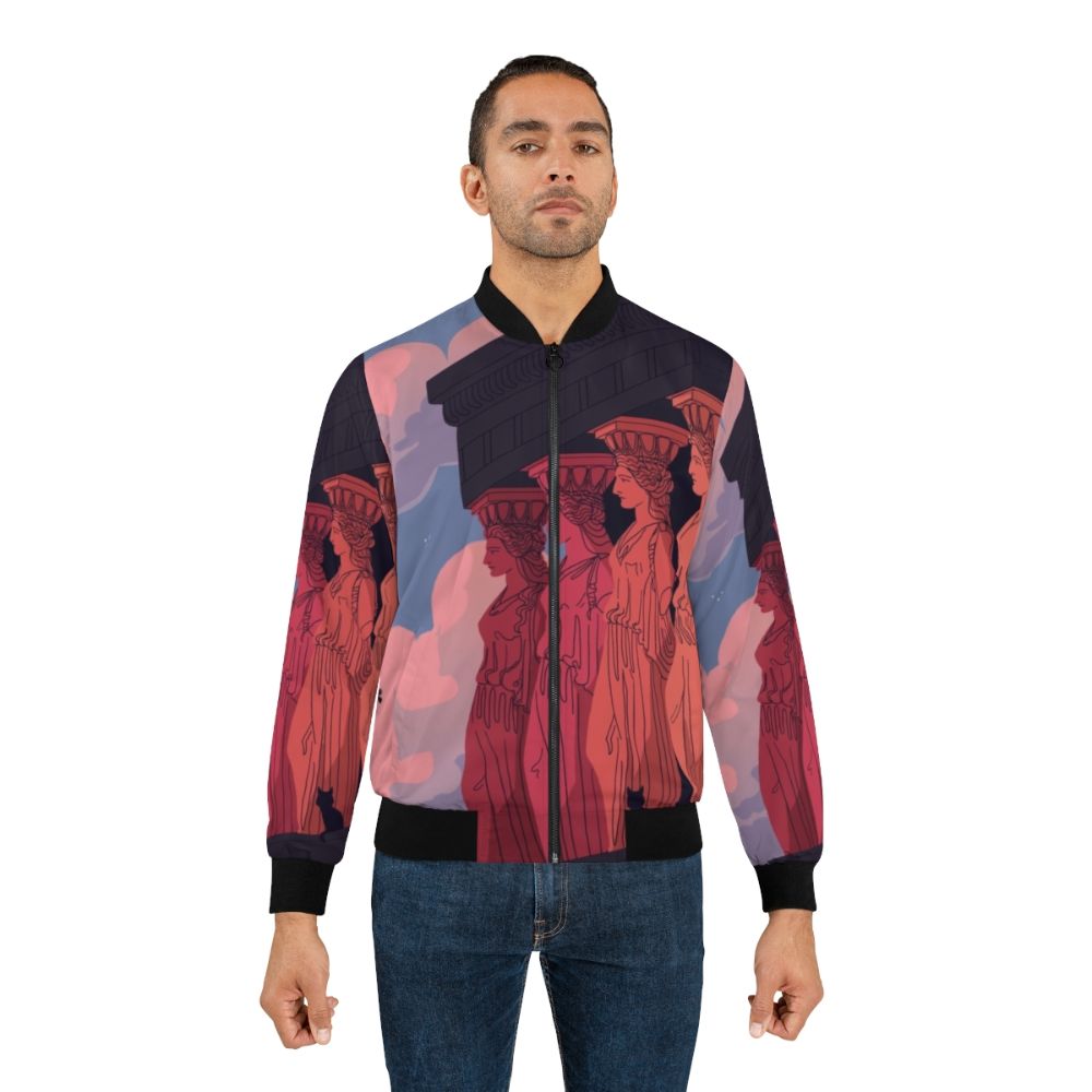 Bomber jacket featuring a landscape design with caryatids, ancient Greek architectural elements, against a dusk sky background - Lifestyle