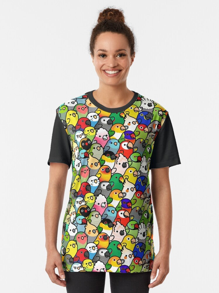 Graphic t-shirt featuring a colorful pattern of various parrot species including cockatiel, cockatoo, and more. - Women