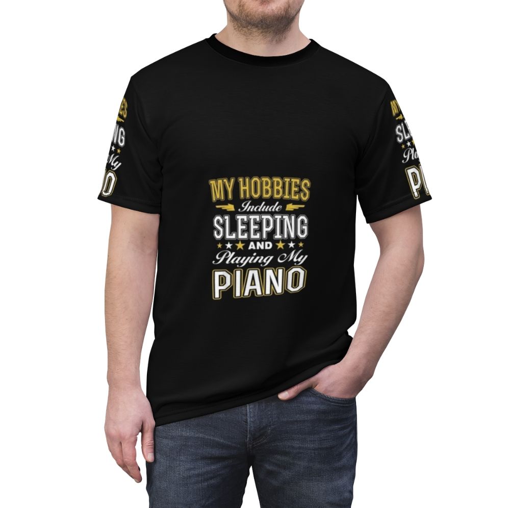 T-shirt design featuring the text "Hobbies Include Sleeping Playing Piano" with a musical note and piano keys - men front