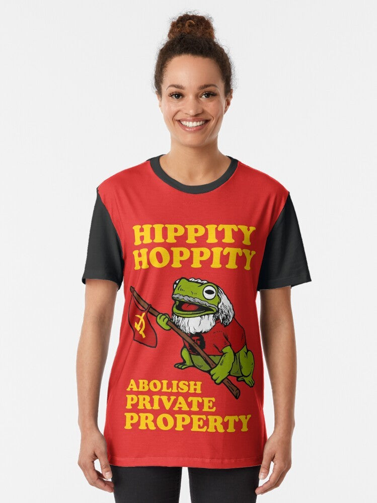 Graphic t-shirt featuring a frog and the phrase "Hippity Hoppity Abolish Private Property" - Women