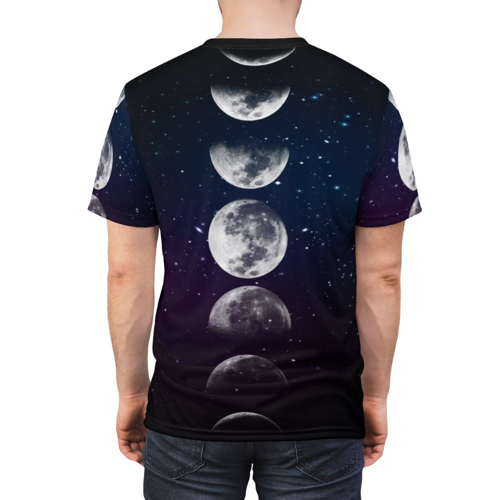 Unisex t-shirt featuring a watercolor design with the phases of the moon and a cosmic, space-inspired aesthetic. - men back