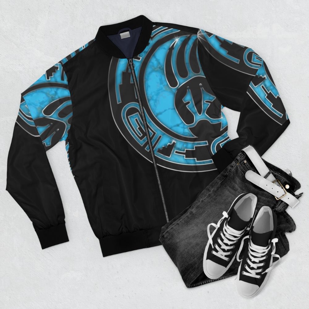 Hopi Native American bomber jacket with turquoise and cultural intertribal design - Flat lay