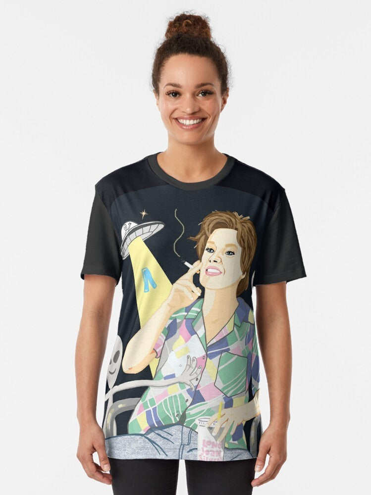 Graphic t-shirt featuring Kate McKinnon as Ms Rafferty from SNL in an alien abduction scene, for LGBT+ fans - Women