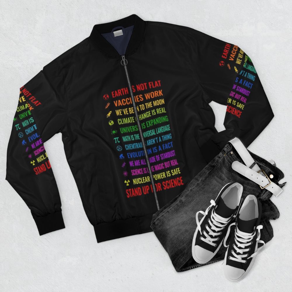 Bomber jacket with "Stand up for science" graphic and scientific symbols - Flat lay