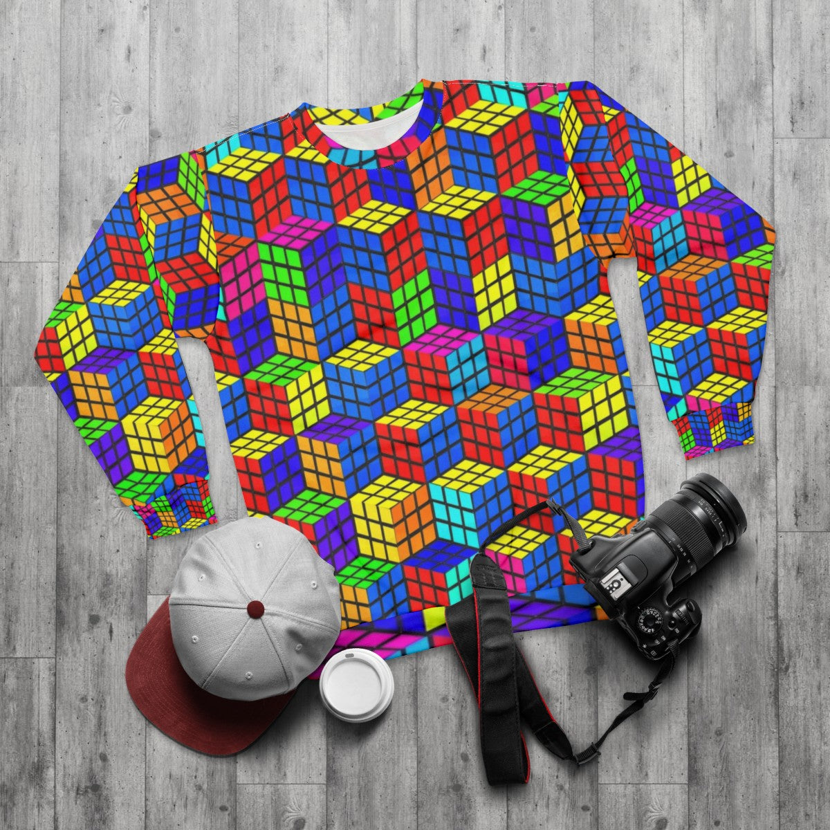 Rubik's Cube optical illusion sweatshirt with colorful, abstract geometric design - flat lay