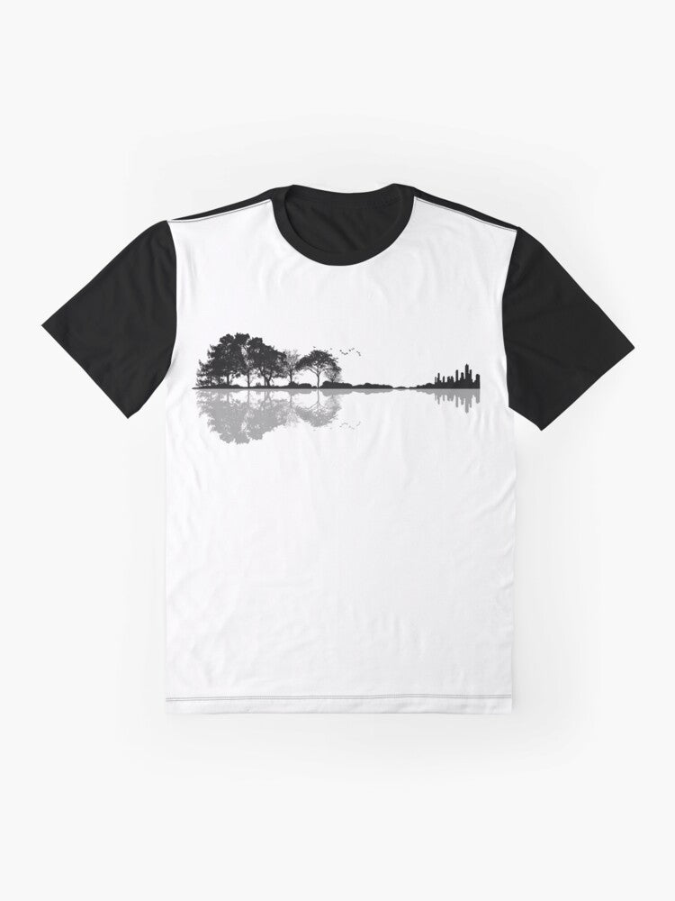 Minimalist nature guitar t-shirt design with silhouette trees, mountains, and birds in black and white - Flat lay